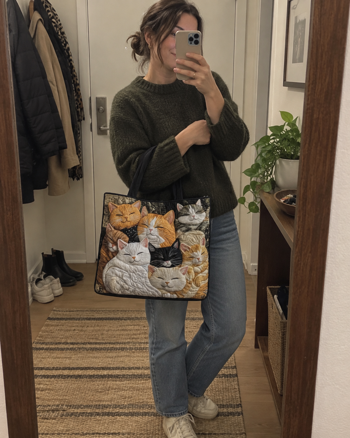 Customer carrying a quilted cat tote