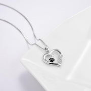 Collar con huella de pata y corazón con colgante de infinito